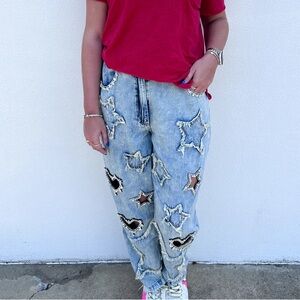 A RARE BIRD: Stars and hearts cutout bling jeans size small